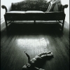 Nude on couch with doll
